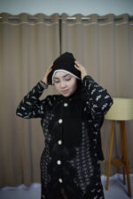 Classic Winter Knit Hat – Black & White Trim   শীতকালীন নিট টুপি – কালো-সাদা বর্ডার