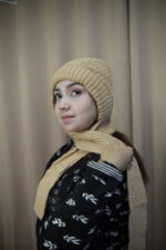 Beige Knit Beanie – Elegant Texture & Warmth   বেইজ নিট টুপি – আভিজাত্যপূর্ণ টেক্সচার ও উষ্ণতা - Image 5